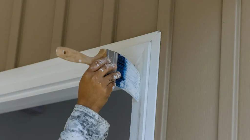Identify the cause of the gap between door trim and wall